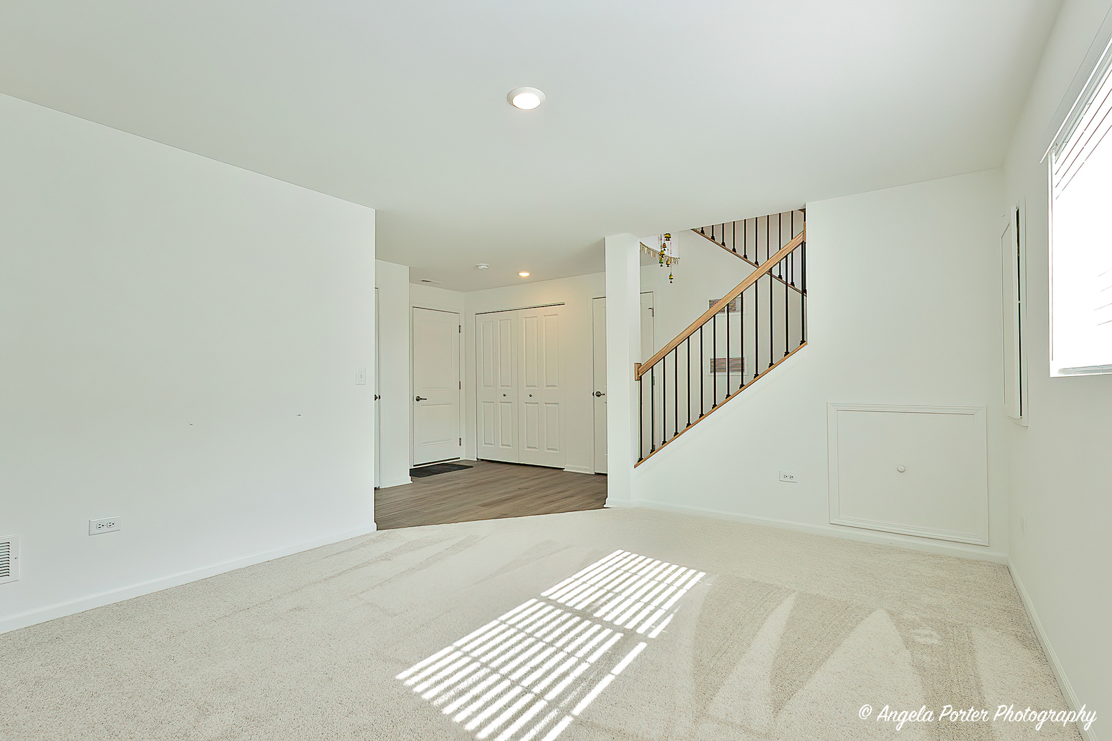 1004 Neubauer Circle Lindenhurst, IL 60046 - Photo 16 of 29 a view of a hallway with wooden floor and windows
