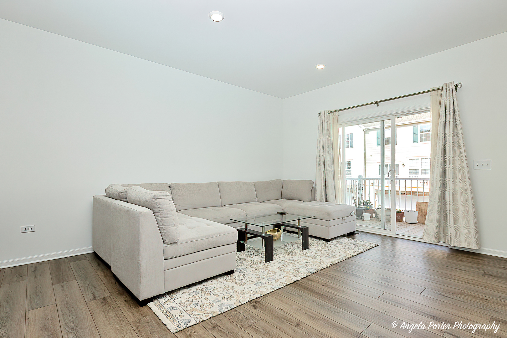 1004 Neubauer Circle Lindenhurst, IL 60046 - Photo 9 of 29 a living room with furniture and wooden floor
