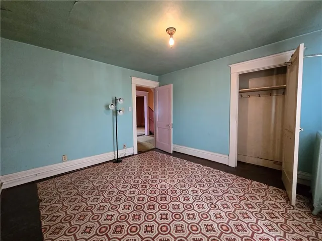 an empty room with a door