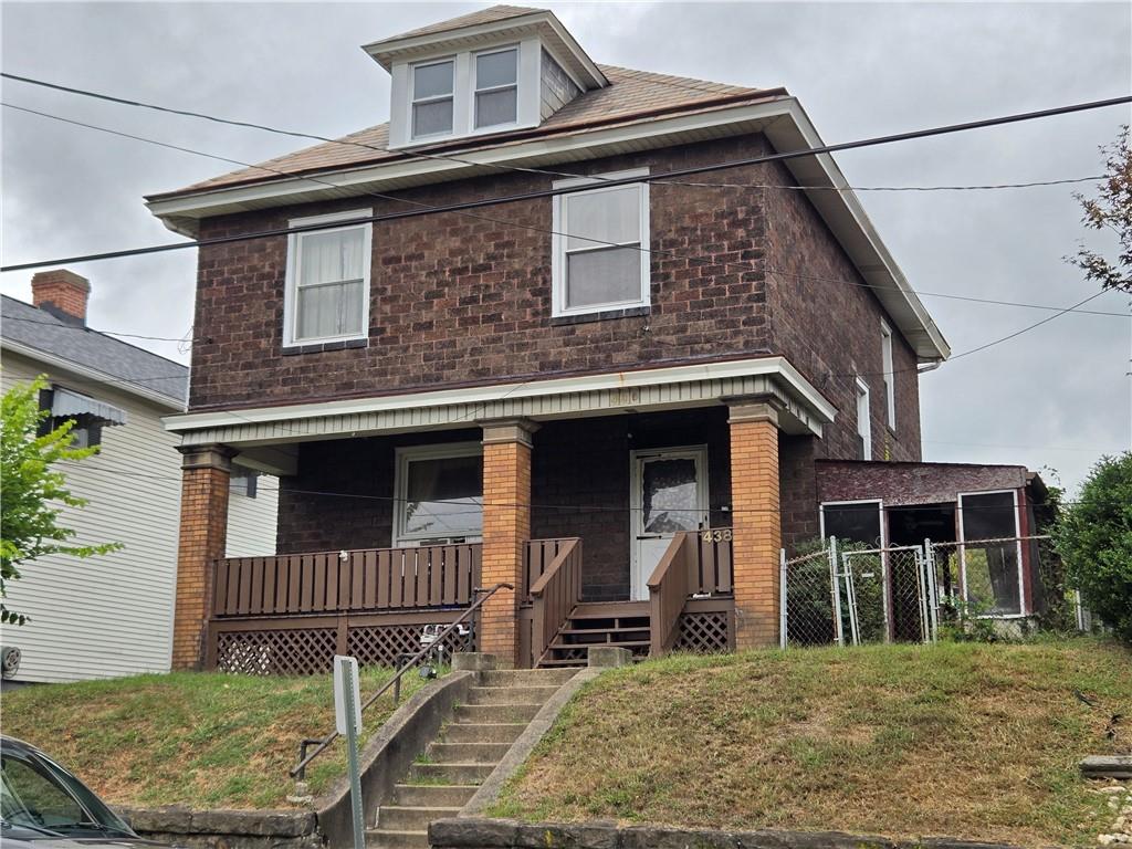 438 8th Street Donora, PA 15033 - Photo 26 of 26 a front view of a house with garage
