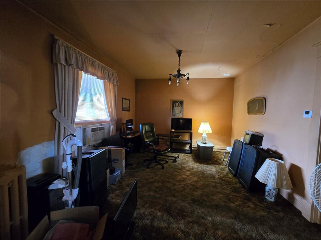 438 8th Street Donora, PA 15033 - Photo 6 of 26 a living room with furniture and a window