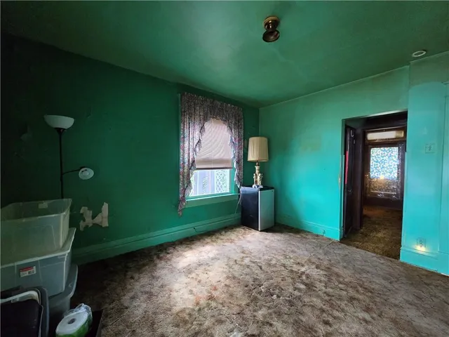 a view of a room that has a window