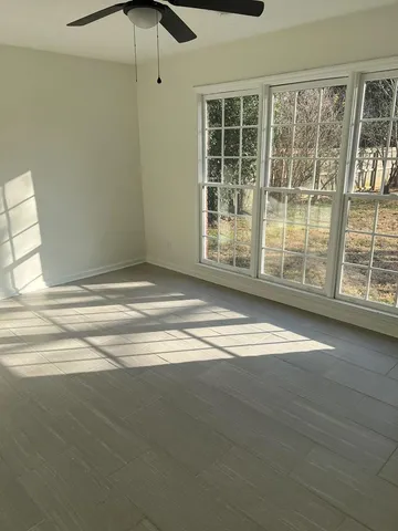 a view of empty room with windows