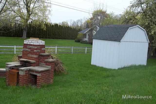 5831 Lakeshore Road Lexington, MI 48450 - Photo 4 of 15 back yard