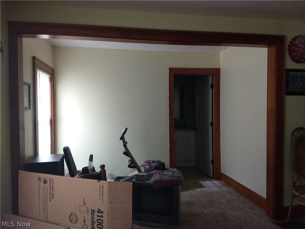 13084 Emerson Road Kidron, OH 44606 - Photo 10 of 13 Bonus room. Could be an extension of the living room, a formal dining room, an office, a toy room. The possibilities are endless!