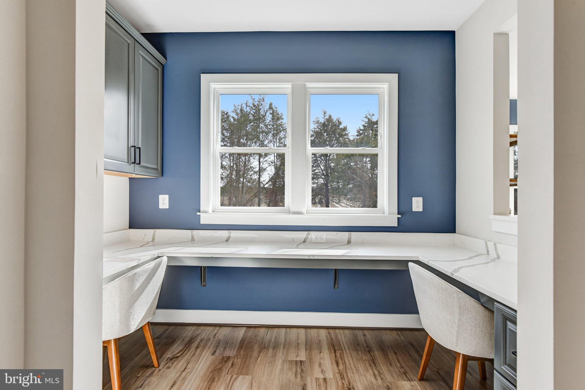 43199 Dogan Rdg Place Centreville, VA 20120 - Photo 11 of 86 Bright workspace with serene blue accents.