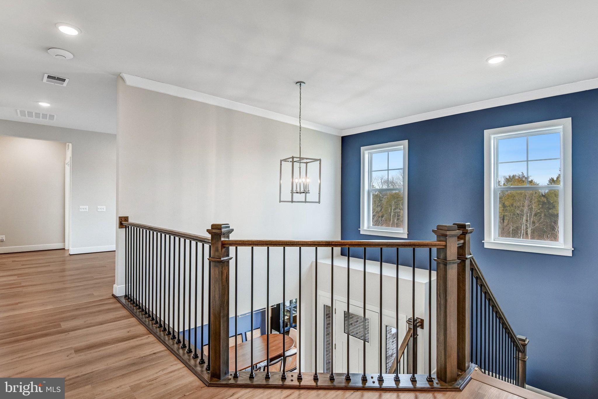 43199 Dogan Rdg Place Centreville, VA 20120 - Photo 30 of 86 Elegant staircase with modern accents.