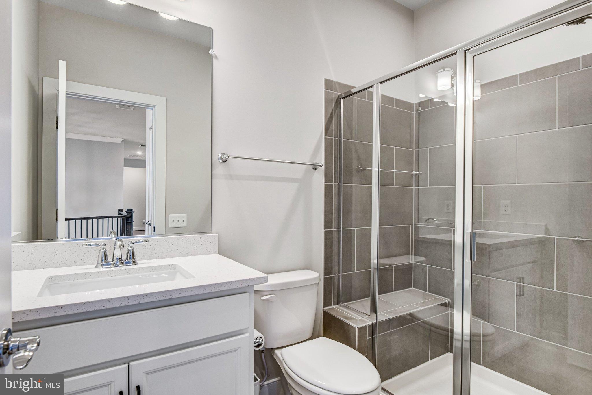 43199 Dogan Rdg Place Centreville, VA 20120 - Photo 34 of 86 Sleek modern bathroom with elegant finishes.