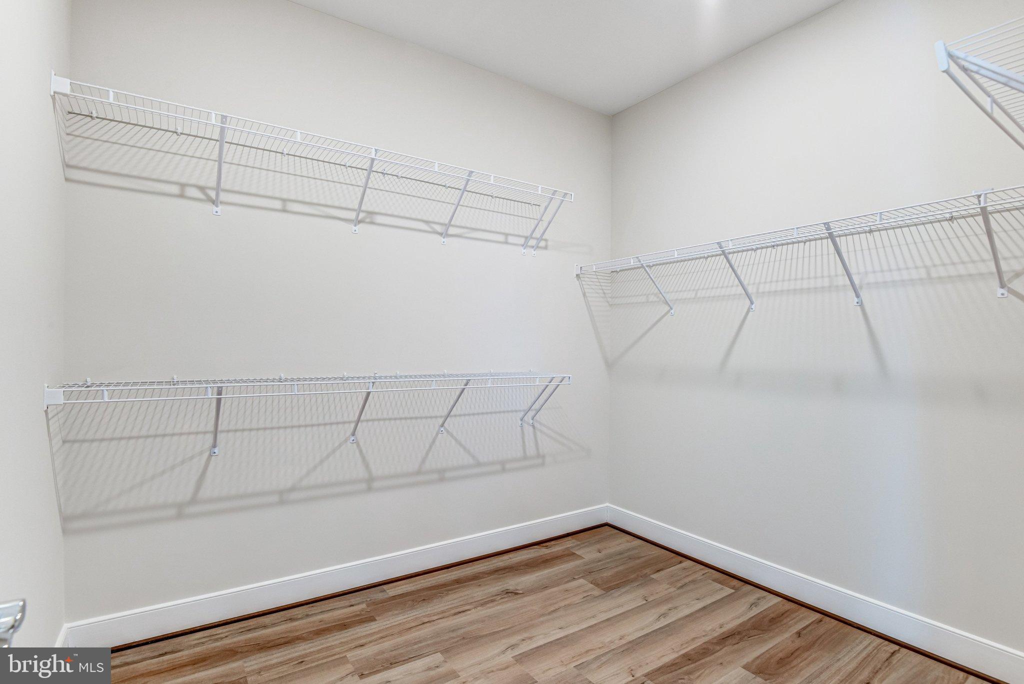 43199 Dogan Rdg Place Centreville, VA 20120 - Photo 38 of 86 a view of a room with racks on the wall