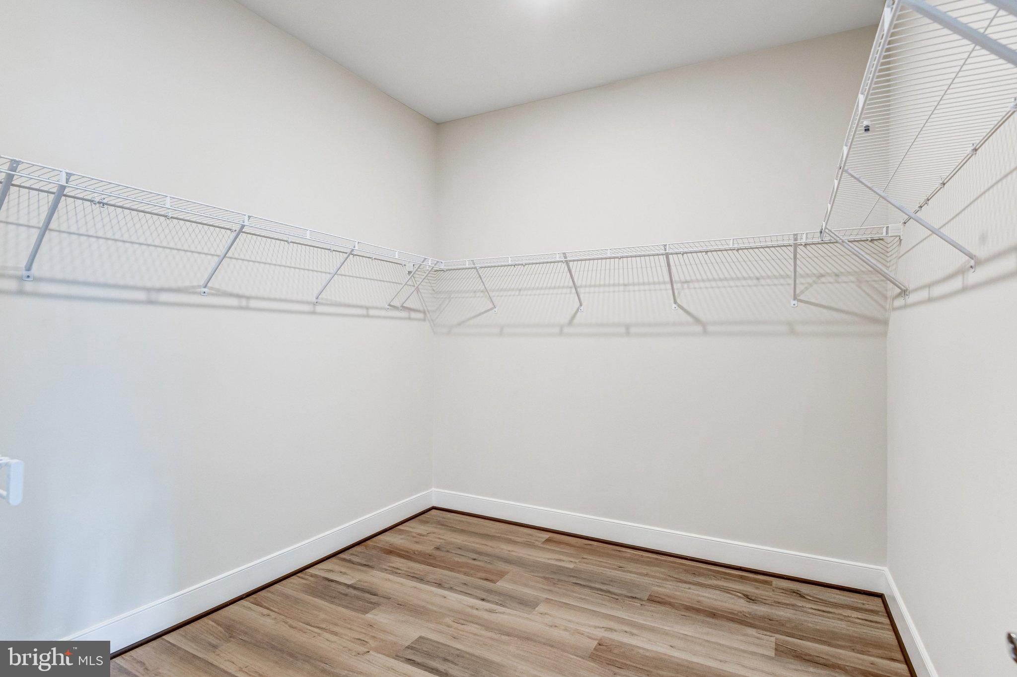 43199 Dogan Rdg Place Centreville, VA 20120 - Photo 39 of 86 a view of a room with racks on the wall