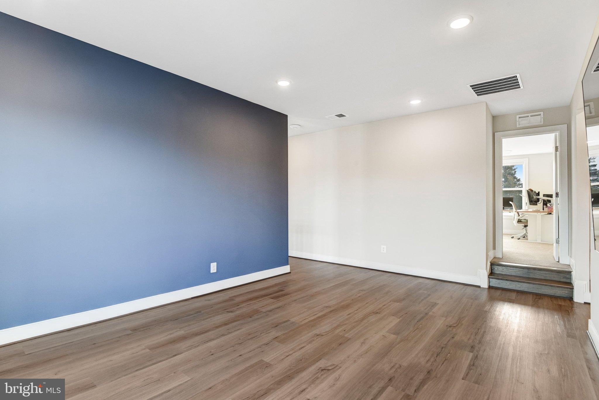 43199 Dogan Rdg Place Centreville, VA 20120 - Photo 44 of 86 a view of an empty room with wooden floor