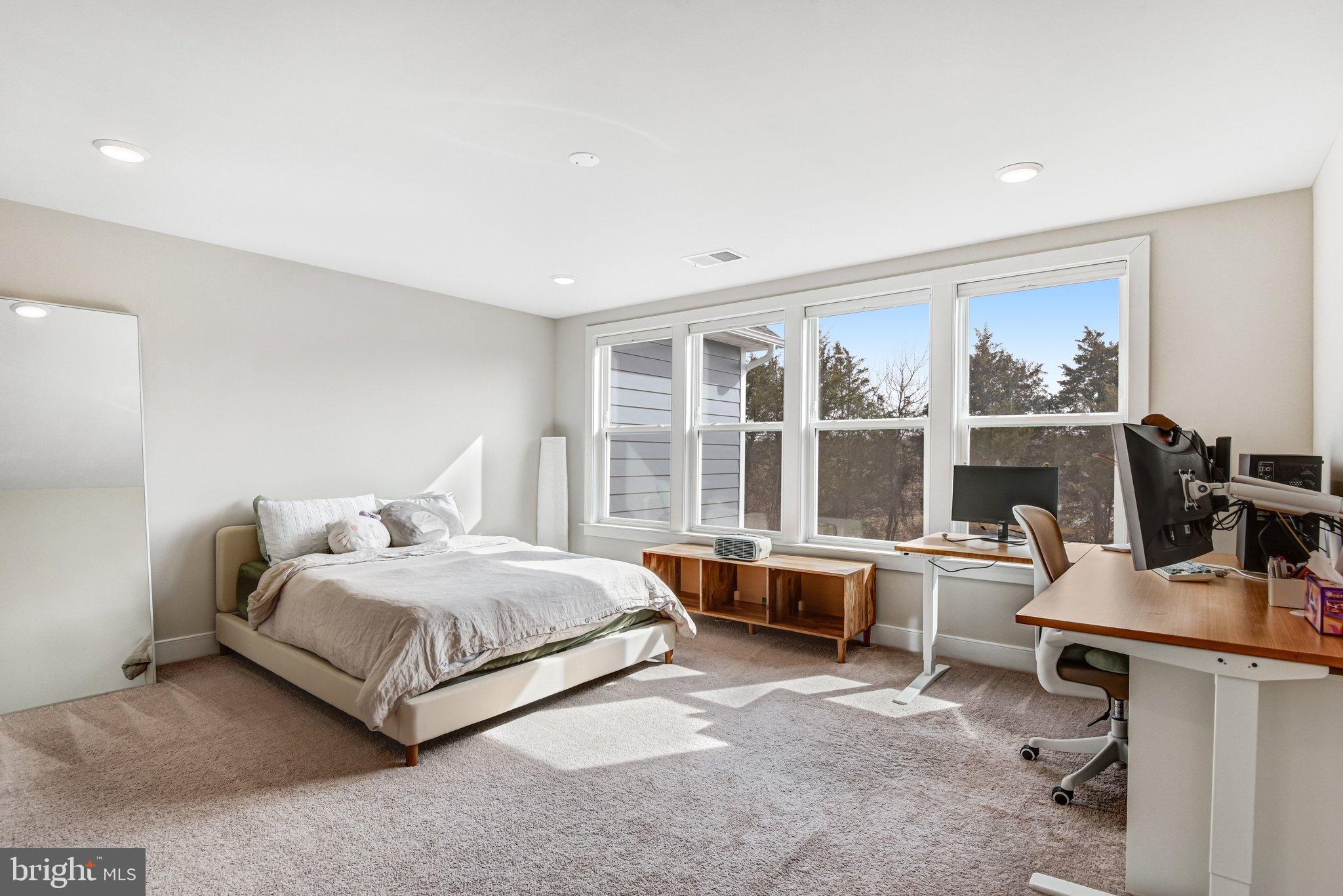 43199 Dogan Rdg Place Centreville, VA 20120 - Photo 45 of 86 a living room with furniture and large windows