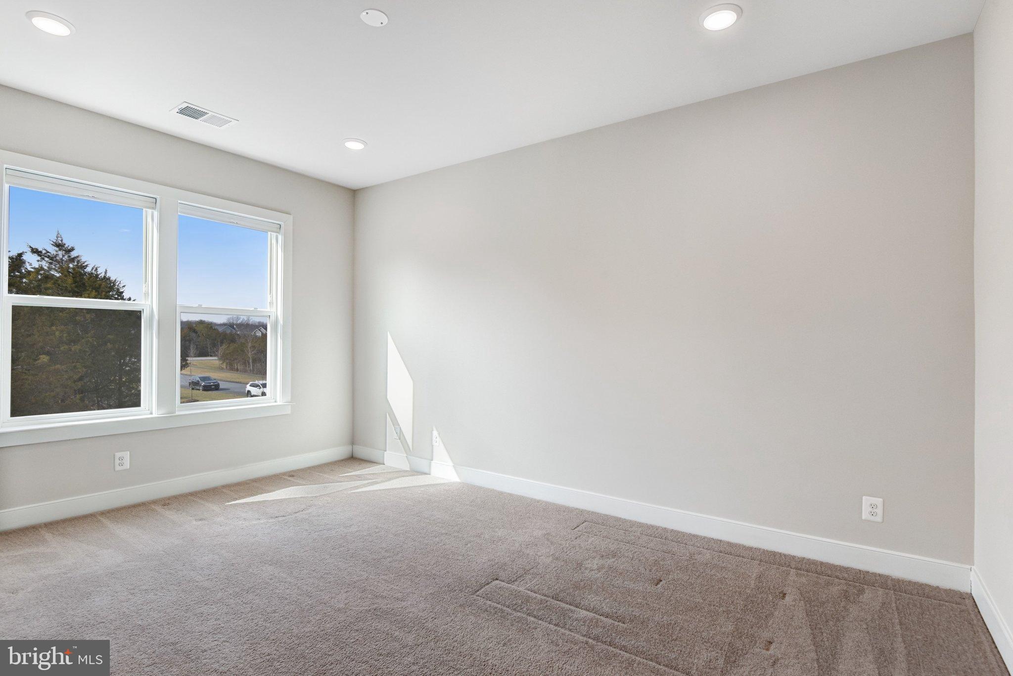 43199 Dogan Rdg Place Centreville, VA 20120 - Photo 49 of 86 a view of an empty room with a window