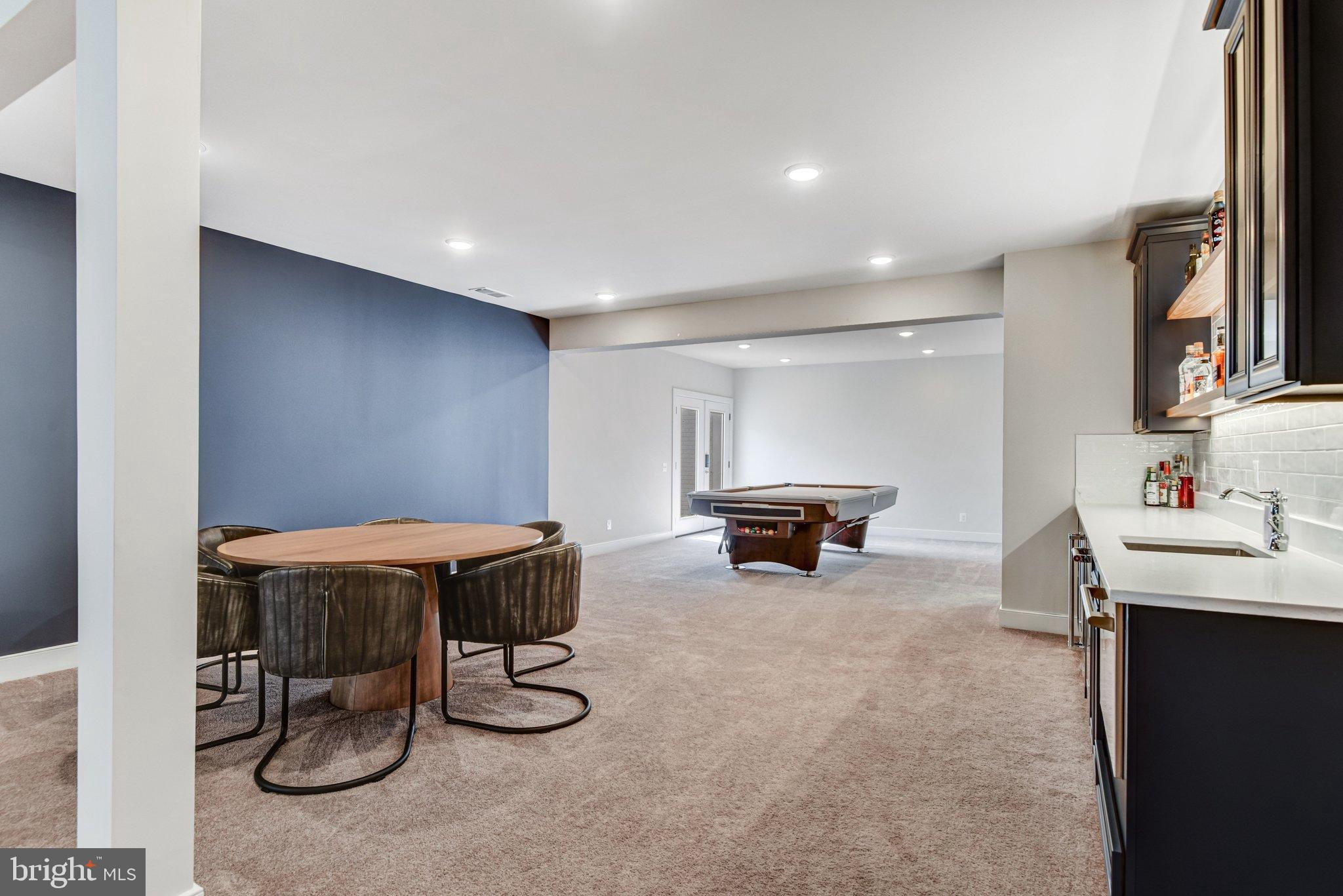 43199 Dogan Rdg Place Centreville, VA 20120 - Photo 60 of 86 Spacious entertainment area with modern flair.