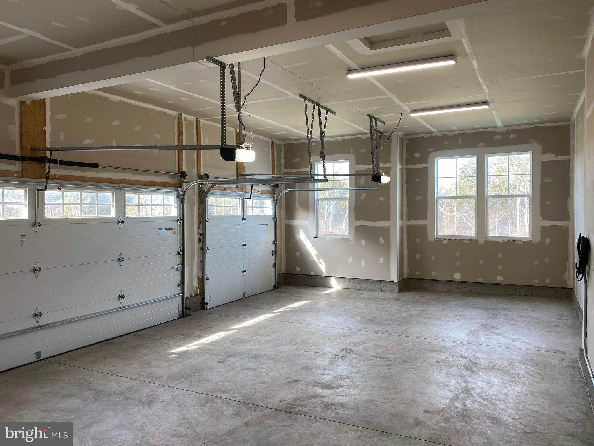 43199 Dogan Rdg Place Centreville, VA 20120 - Photo 75 of 86 Spacious garage with natural light.