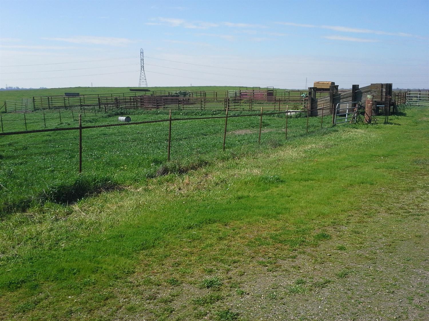 29939 Highway 4 Farmington, CA 95230 - Photo 9 of 25 a view of a field with a play ground