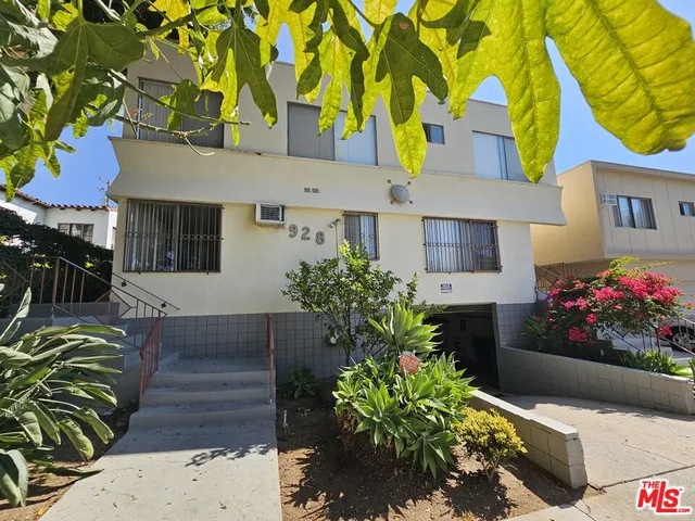 a front view of house with an outdoor space