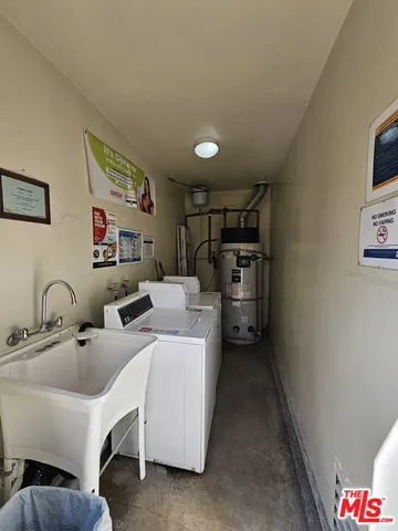 a storage room with washer and dryer