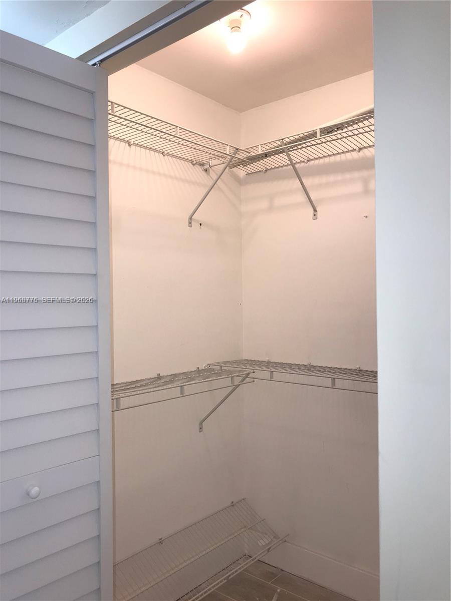 3100 Riverside Drive, Unit 108 Coral Springs, FL 33065 - Photo 10 of 14 Master Walking closet