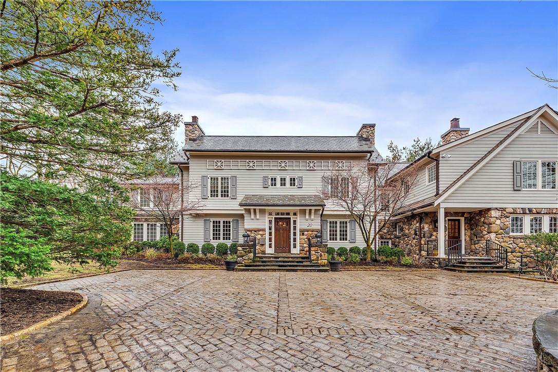 20 Oxford Road Scarsdale, NY 10583 - Photo 1 of 1 a front view of a house with a yard