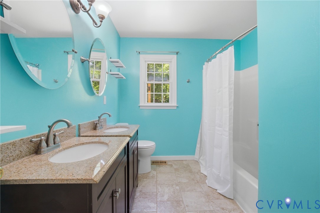 2512 Brookforest Road Midlothian, VA 23112 - Photo 20 of 40 Bathroom featuring a dual vanity with granite-styl