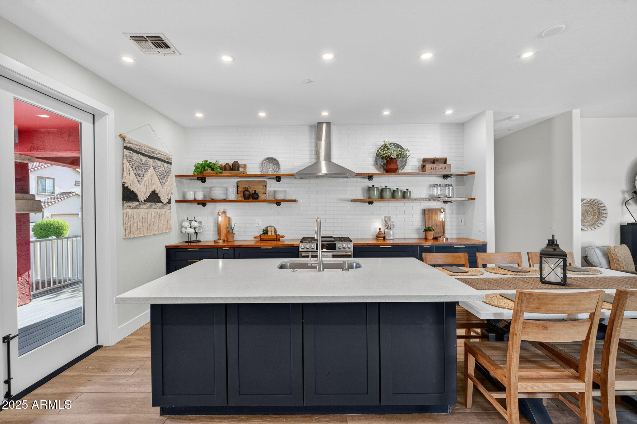 3059 East Agritopia Loop North Gilbert, AZ 85296 - Photo 11 of 85 a kitchen with a sink and cabinets