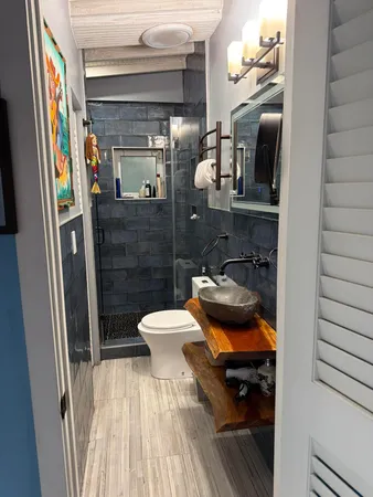 a view of a street with benches