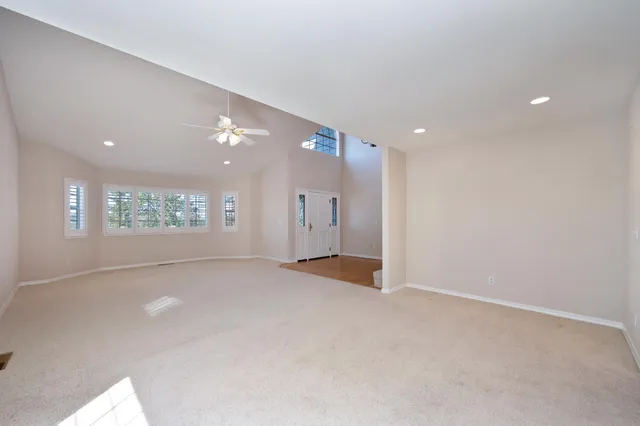 a view of a livingroom with furniture and a fireplace