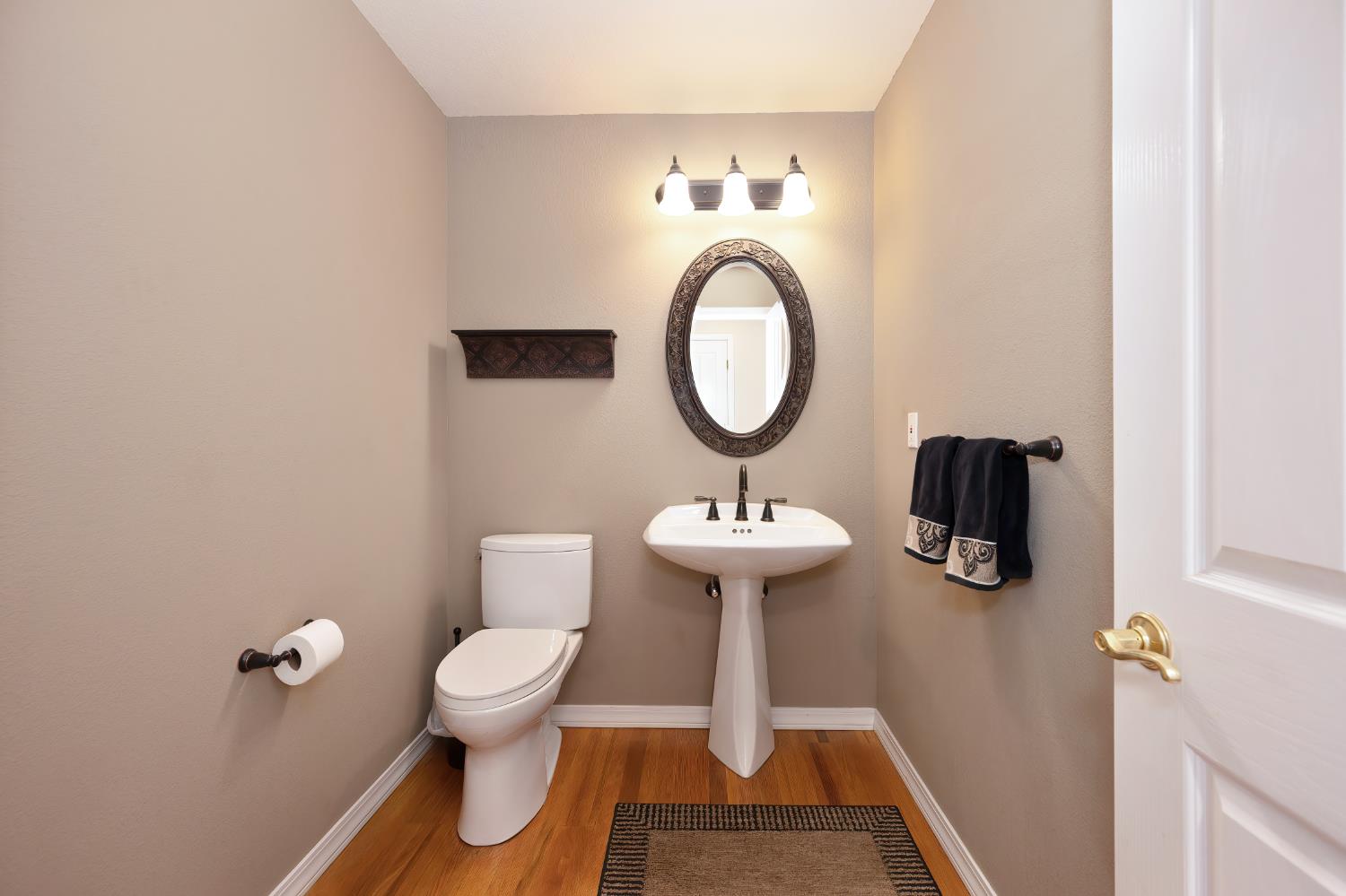 3730 Kimo Way Auburn, CA 95602 - Photo 26 of 75 a bathroom with a toilet and a sink