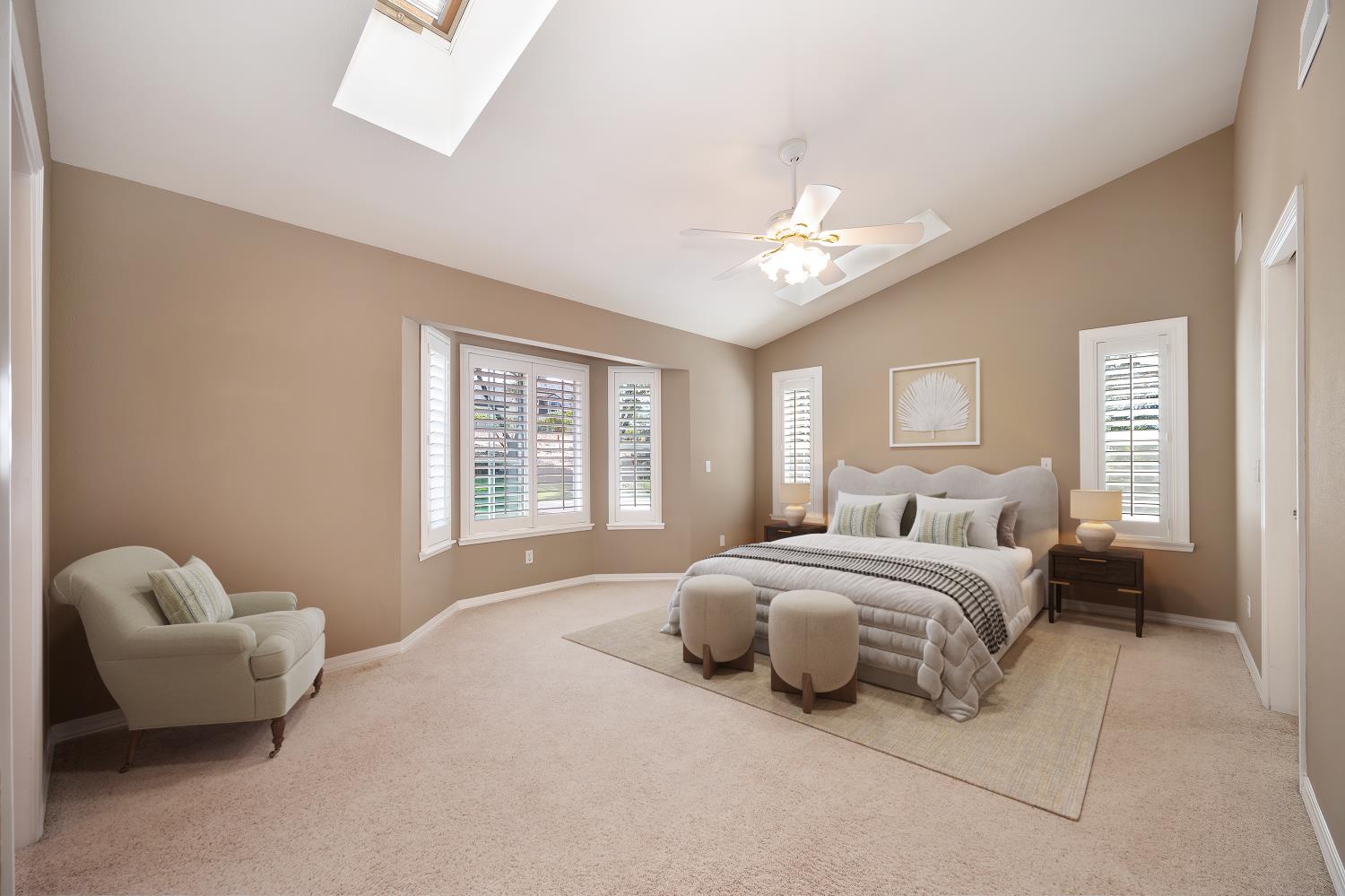 3730 Kimo Way Auburn, CA 95602 - Photo 31 of 75 a spacious bedroom with a bed and a couch