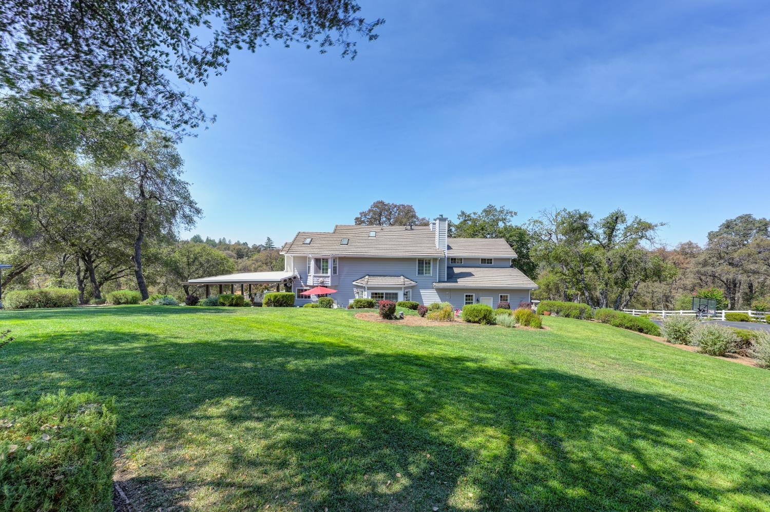 3730 Kimo Way Auburn, CA 95602 - Photo 53 of 75 a front view of a house with a garden