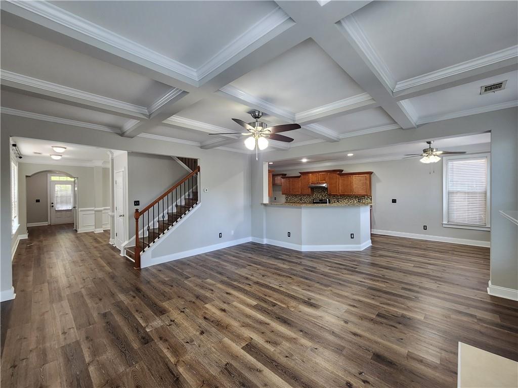 548 Myrtle Trace Lane Suwanee, GA 30024 - Photo 24 of 87 a view of a room with wooden floor