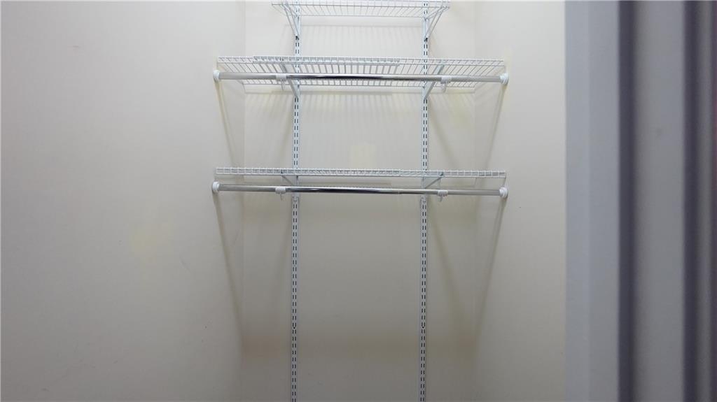 548 Myrtle Trace Lane Suwanee, GA 30024 - Photo 44 of 74 a bathroom with a glass shower door