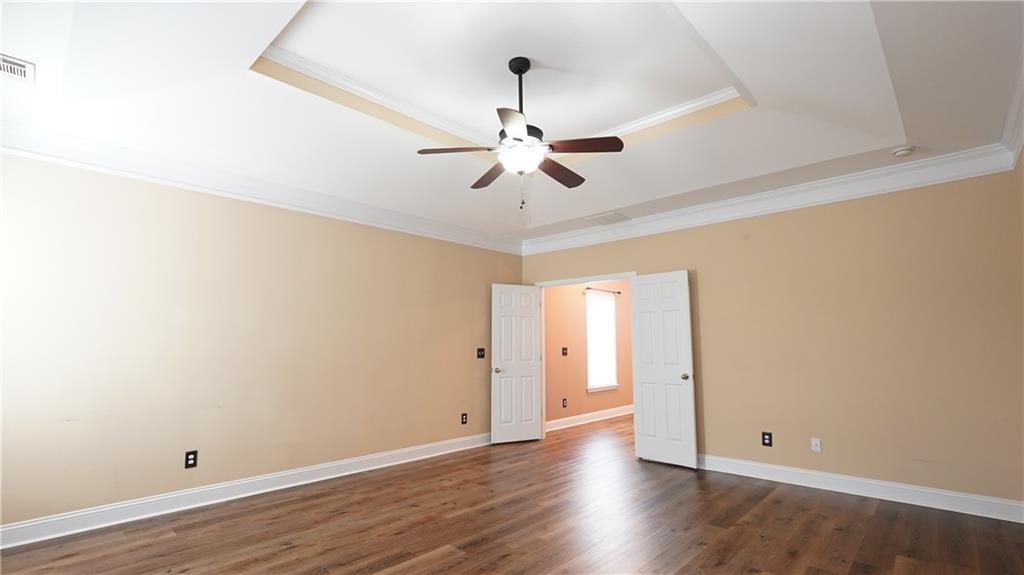 548 Myrtle Trace Lane Suwanee, GA 30024 - Photo 45 of 87 wooden floor in an empty room