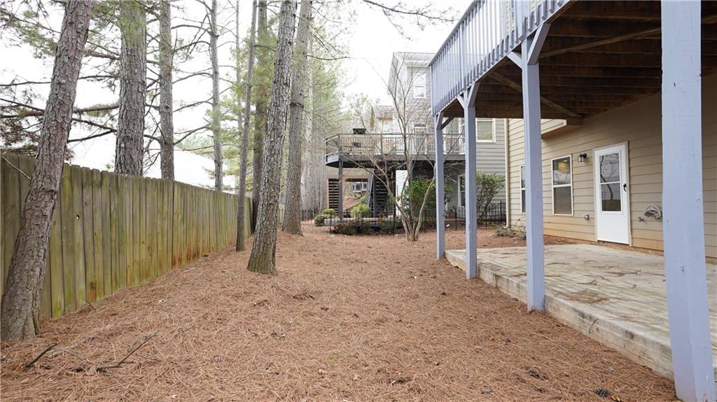 548 Myrtle Trace Lane Suwanee, GA 30024 - Photo 83 of 87 a view of a entrance gate of the house