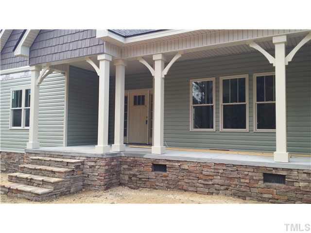 665 Tilghman Road Coats, NC 27521 - Photo 3 of 25 a front view of a house