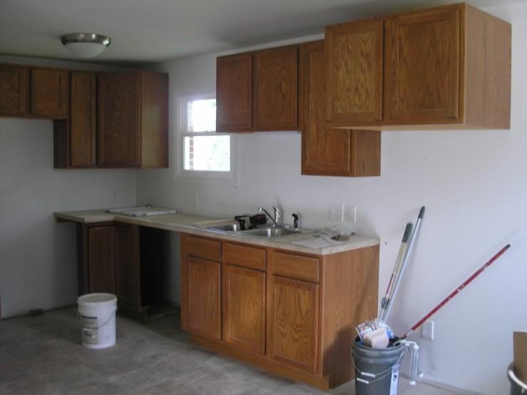 1201 Scuffling Hill Road Rocky Mount, VA 24151 - Photo 3 of 5 a kitchen with a sink and cabinets