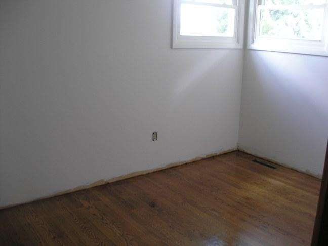 1201 Scuffling Hill Road Rocky Mount, VA 24151 - Photo 4 of 5 an empty room with a window