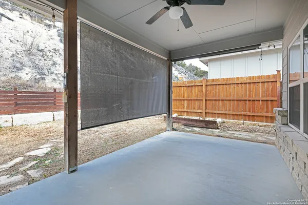 a view of a room with large windows