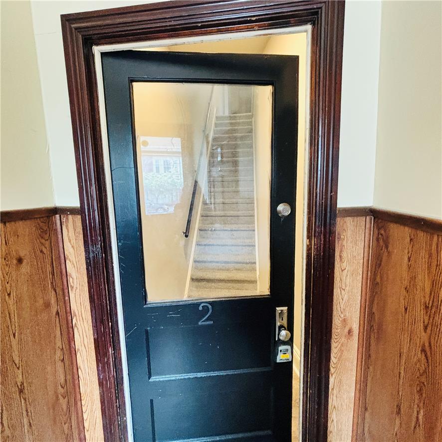 718 Linden Street Bethlehem, PA 18018 - Photo 18 of 19 Secure entry opens to a carpeted staircase leading to upper levels.