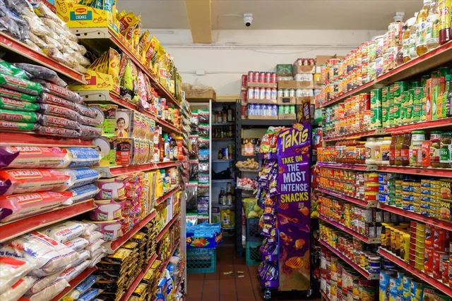 a room with lots of different kinds of flowers