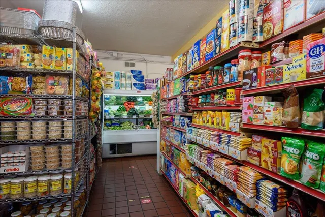 a living room with furniture garage and a window
