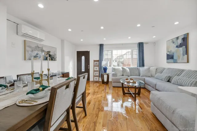 a living room with furniture and a table