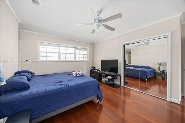 a bedroom with a bed and furniture