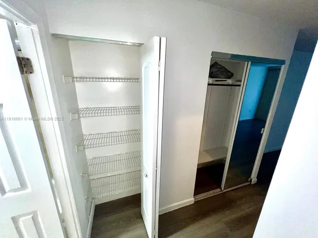 wooden floor in a hall with an entryway