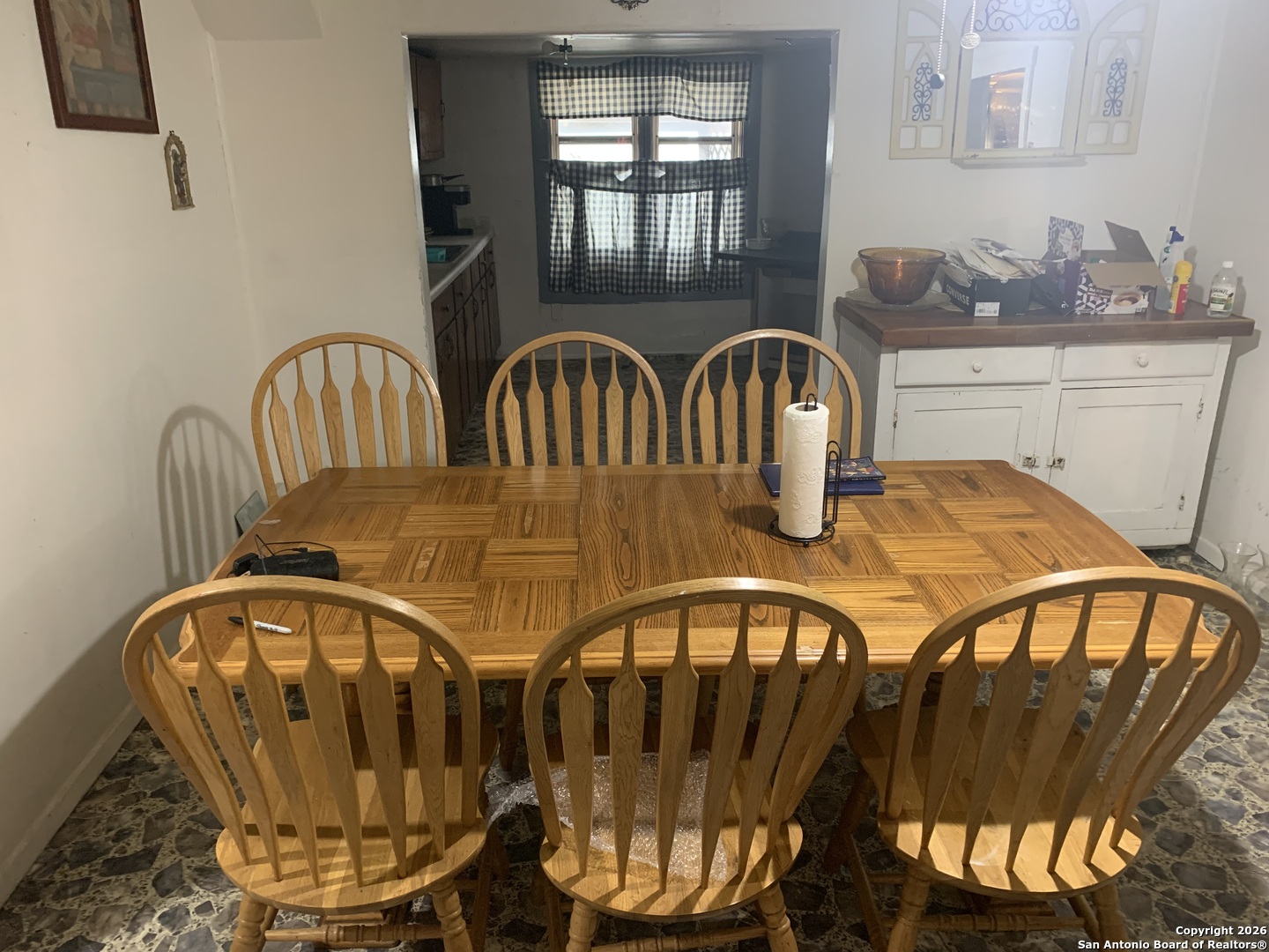 504 6th Street Natalia, TX 78059 - Photo 4 of 6 a view of a dining room with furniture
