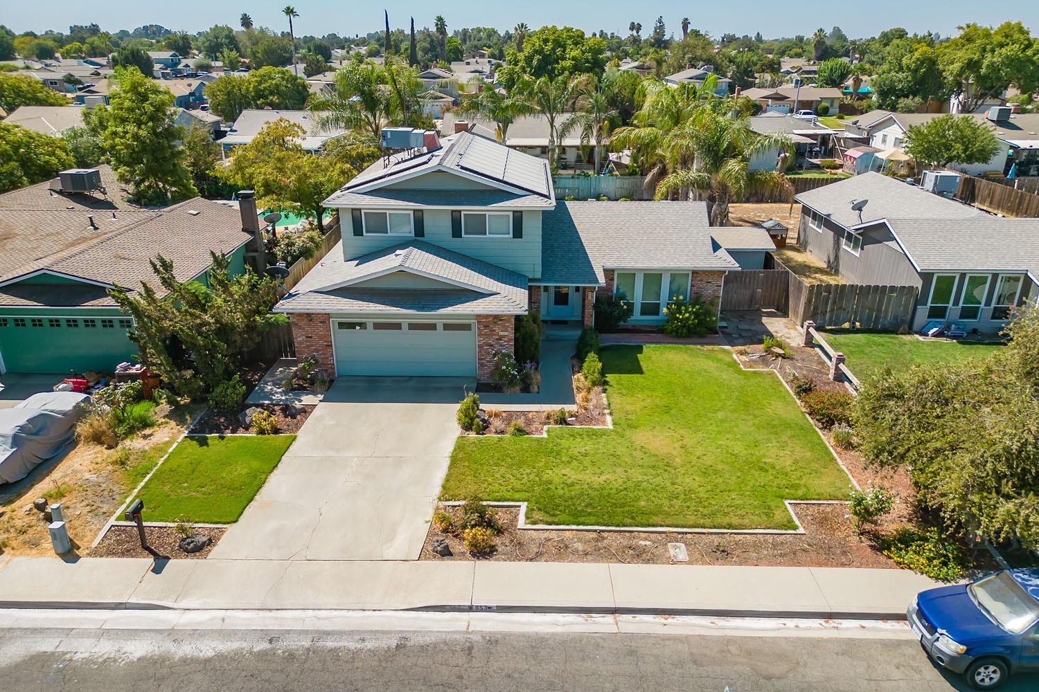 653 Meadow Lane Lemoore, CA 93245 - Photo 35 of 43 an aerial view of a house