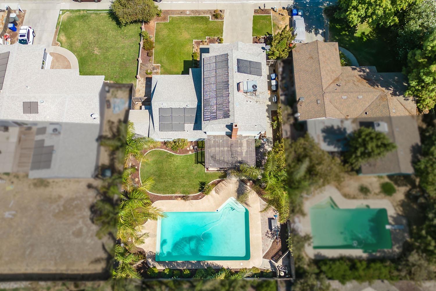 653 Meadow Lane Lemoore, CA 93245 - Photo 37 of 43 an aerial view of residential houses with outdoor space and street view