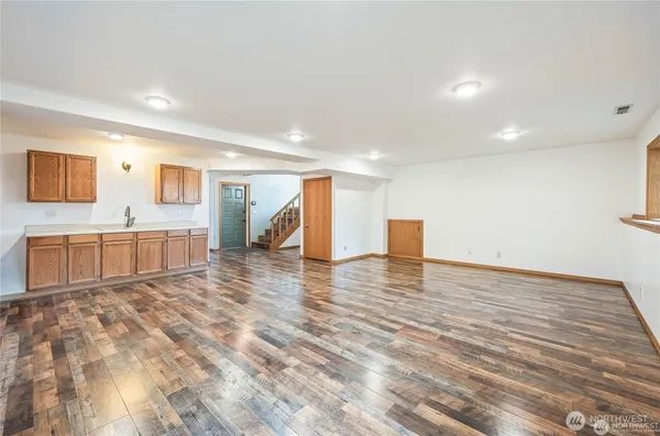 a view of a kitchen with a sink
