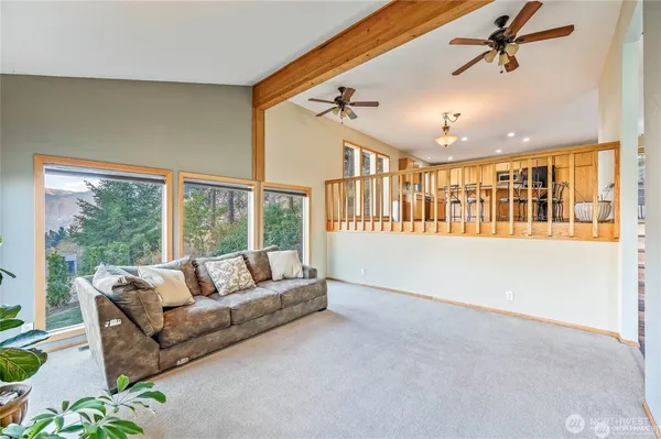 a living room with furniture and windows
